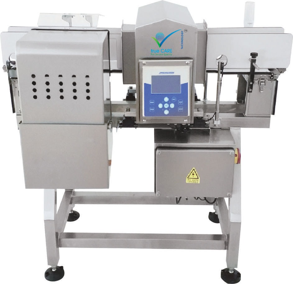 CONVEYORIZED METAL DETECTOR FOR BOTTLES